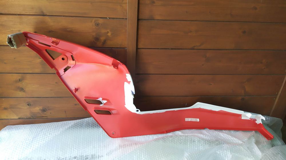 coppia carene posteriori bianco/arancio honda nsr 125 r - una con attacco rotto -